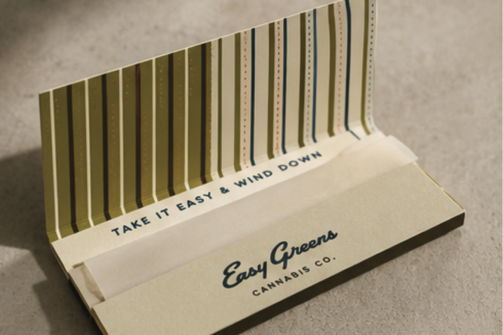 A single hand-rolled pre-roll on a tray.